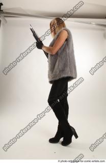 13 2018 01 NIKOL STANDING POSE WITH SHOTGUN